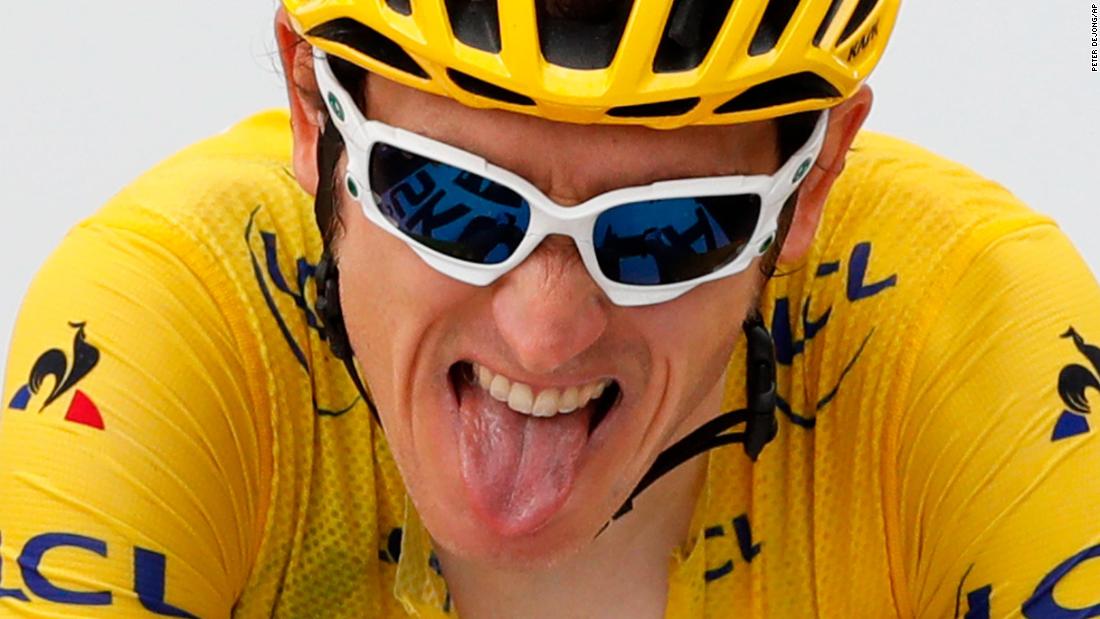 British cyclist Geraint Thomas grimaces as he crosses the finish line on July 25. He had been leading the Tour since the end of the 11th stage.