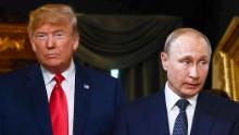 US President Donald Trump (L) and Russian President Vladimir Putin arrive for a meeting in Helsinki, on July 16, 2018. (Photo by Brendan Smialowski / AFP)        (Photo credit should read BRENDAN SMIALOWSKI/AFP/Getty Images)