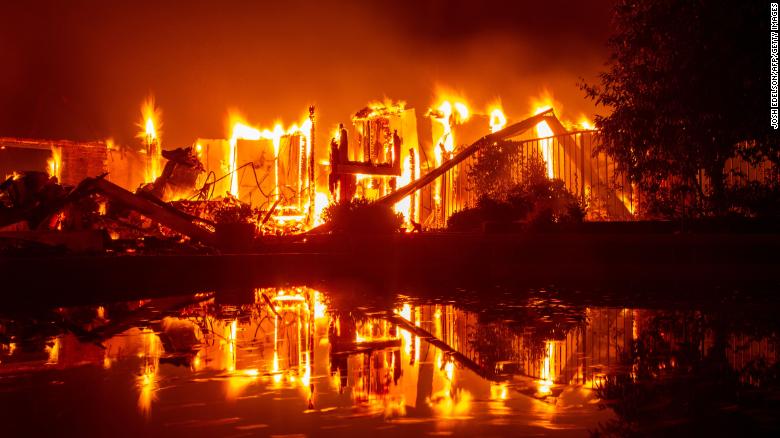 Flames engulf a home in Redding, California.