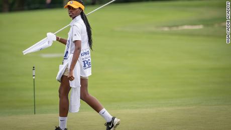 Atim Bedell caddies at the KPMG Women's PGA Championship, which is the LPGA's second-oldest tournament. 