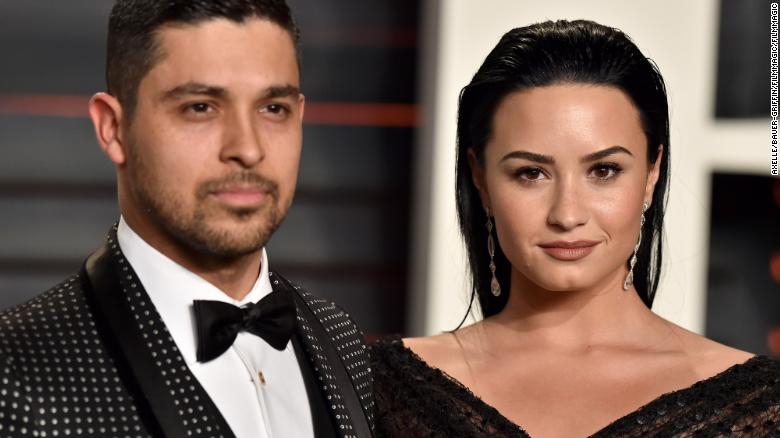 Wilmer Valderrama and singer Demi Lovato at the 2016 Vanity Fair Oscar Party 