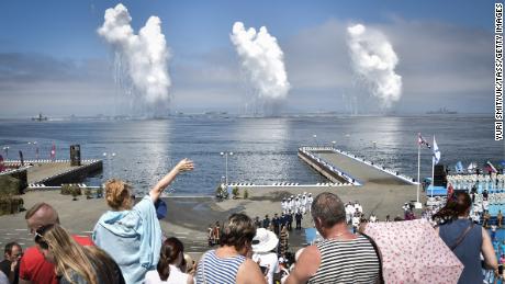 Spectators watch the naval parade marking Russian Navy Day. 