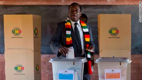 Zimbabwean President Emmerson Mnangagwa casts his vote Monday.