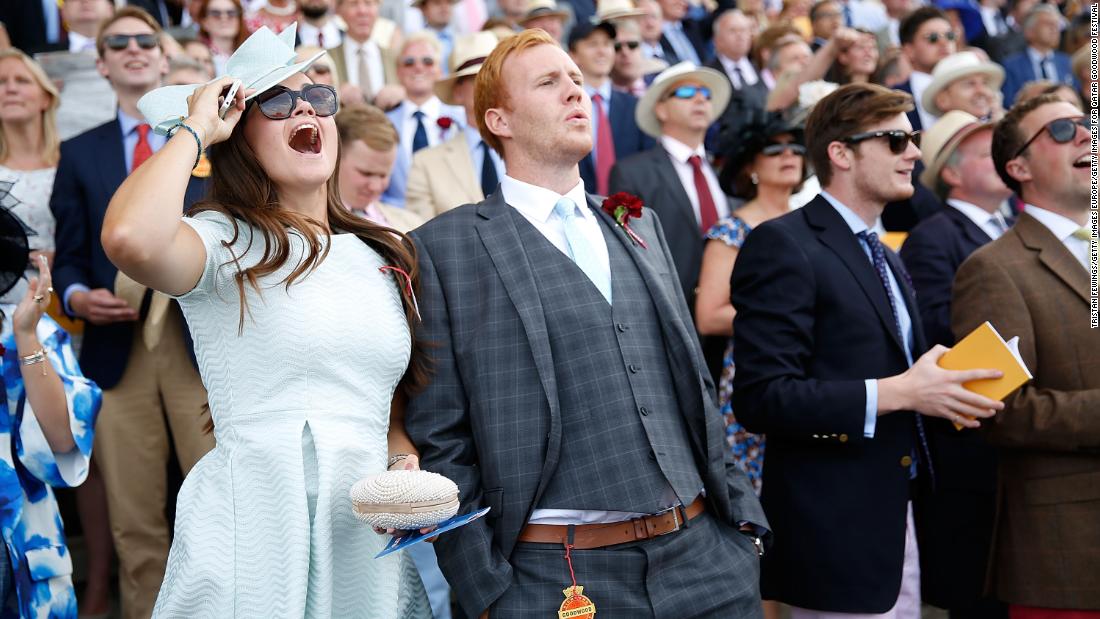Racegoers take in the drama of the Qatar Goodwood Festival, commonly known as &quot;Glorious Goodwood.&quot; 