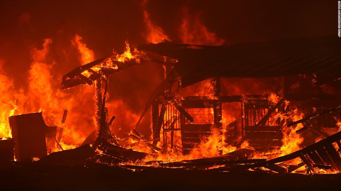 A barn burns on Tuesday, July 31, as the River Fire moves through Lakeport.