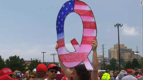 Born on the dark fringes of the internet, QAnon is now infiltrating mainstream American life and politics