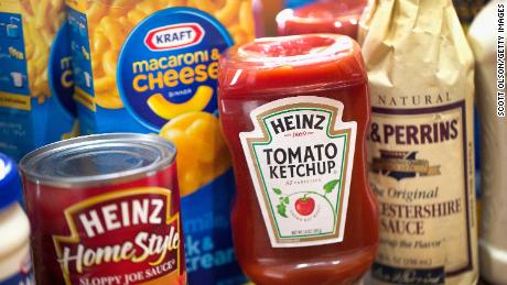 CHICAGO, IL - MARCH 25: In this photo illustration, Kraft and Heinz products are shown on March 25, 2015 in Chicago, Illinois. Kraft Foods Group Inc. said it will merge with H.J. Heinz Co. to form the third largest food and beverage company in North America with revenue of about $28 billion.  (Photo by Scott Olson/Getty Images)