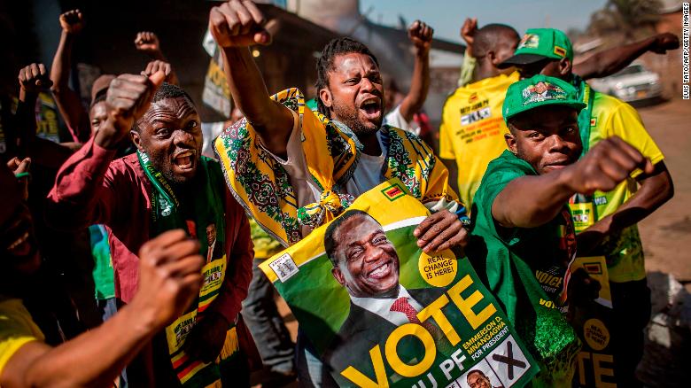 Supporters celebrate after Mnangagwa is declared the winner in Zimbabwe&#39;s landmark election.