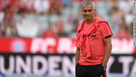 Manchester United&#39;s Portuguese manager Jose Mourinho attends the warm up prior to the pre-season friendly football match between FC Bayern Munich and Manchester United at the Allianz Arena in Munich, southern Germany, on August 5, 2018. (Photo by Christof STACHE / AFP)        (Photo credit should read CHRISTOF STACHE/AFP/Getty Images)