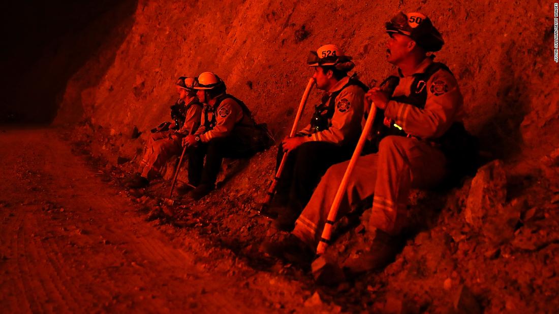 Firefighters work on stopping the Mendocino Complex Fire, which is made up of the River and Ranch fires.