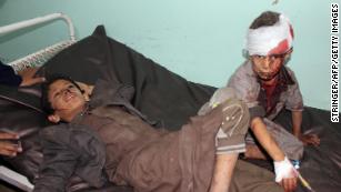 Yemeni children receive treatment at a hospital after being wounded in the August 9 strike.
