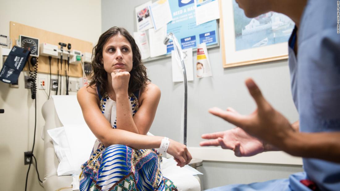 Kate Weissman listens as her oncologist, Dr. Whitfield Growdon, goes over her latest results. Her scans have shown no signs of her cancer returning. &quot;It&#39;s amazing,&quot; he says.