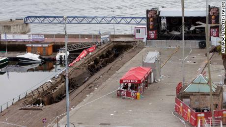 It is currently unclear why the platform, seen on the left, collapsed during the concert Sunday night.