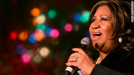 Aretha Franklin performs during the 85th annual Christmas tree lighting at the New York Stock Exchange, Thursday, Dec. 4, 2008 in New York.  (AP Photo/Mary Altaffer)