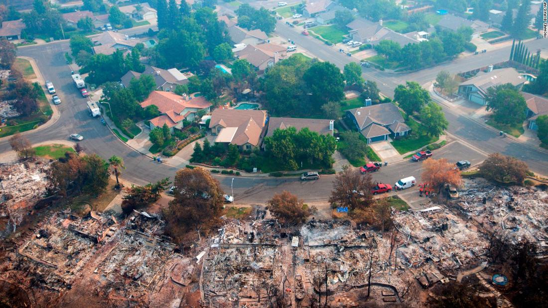 Homes destroyed by a wildfire in Redding, California are seen from an aerial view on Friday, August 10