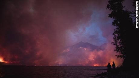 The Howe Ridge Fire is seen on the night of August 12. 