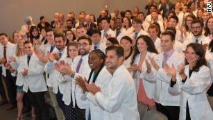 New NYU medical students found out Thursday at their white coat ceremony that their tuition would be covered by a new scholarship.