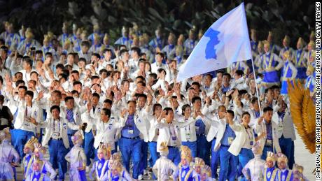 The Unified Korea delegation enters the stadium during the opening ceremony of the Asian Games 2018 at Gelora Bung Karno Stadium on August 18, 2018 in Jakarta, Indonesia.