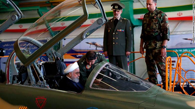 Iranian President Hassan Rouhani sits in the cockpit of the Kowsar fighter jet Tuesday.