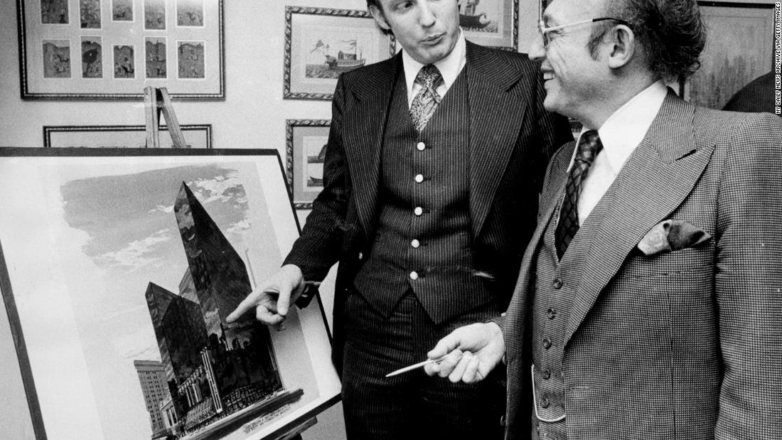 Trump stands with Alfred Eisenpreis, New York&#39;s economic development administrator, in 1976 while they look at a sketch of a new 1,400-room renovation project of the Commodore Hotel. After graduating from college in 1968, Trump worked with his father on developments in Queens and Brooklyn before purchasing or building multiple properties in New York and Atlantic City, New Jersey. Those properties included Trump Tower in New York and Trump Plaza and multiple casinos in Atlantic City.