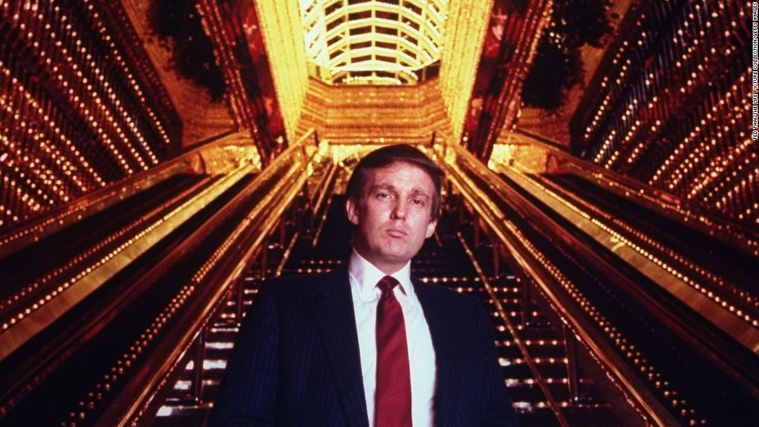 Trump stands in the atrium of Trump Tower.