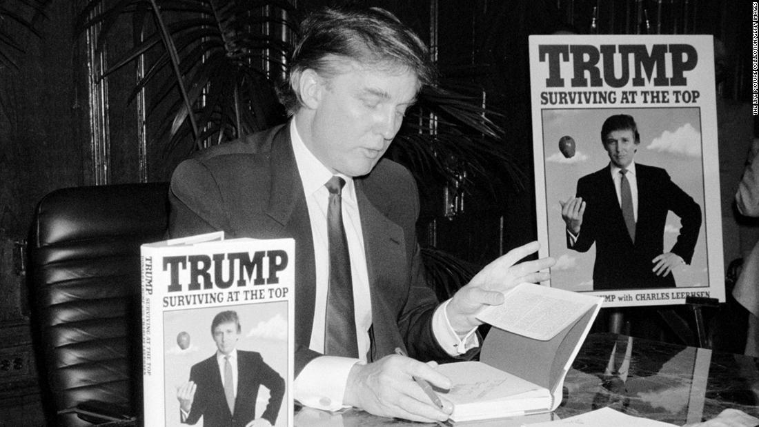 Trump signs his second book, &quot;Trump: Surviving at the Top,&quot; in 1990. Trump &lt;a href=&quot;http://www.trump.com/publications/&quot; target=&quot;_blank&quot;&gt;has published&lt;/a&gt; at least 16 other books, including &quot;The Art of the Deal&quot; and &quot;The America We Deserve.&quot;