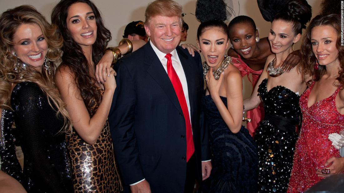 Trump poses with Miss Universe contestants in 2011. Trump had been executive producer of the Miss Universe, Miss USA and Miss Teen USA pageants since 1996.