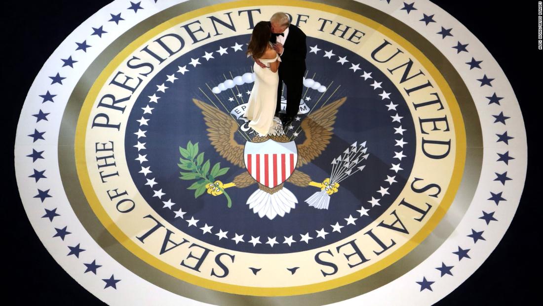 The new president kisses the first lady as they dance at one of &lt;a href=&quot;http://www.cnn.com/2017/01/20/politics/gallery/2017-inaugural-balls/&quot; target=&quot;_blank&quot;&gt;three inaugural balls.&lt;/a&gt; The president, known for his affinity of over-the-top gold fixtures, &lt;a href=&quot;http://www.cnn.com/2017/01/20/politics/inaugural-ball-melania-trump-fashion-2017/&quot; target=&quot;_blank&quot;&gt;went for classic Americana&lt;/a&gt; with a touch of retro glitz.