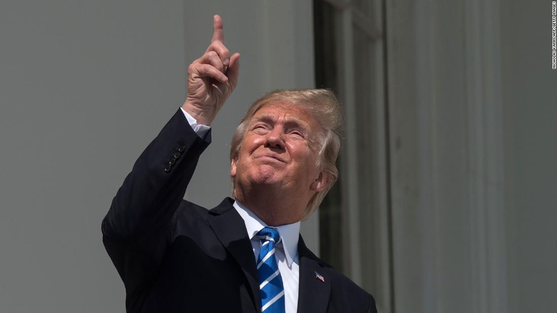 Trump &lt;a href=&quot;http://www.cnn.com/2017/08/21/politics/trump-solar-eclipse/index.html&quot; target=&quot;_blank&quot;&gt;looks up at the sky&lt;/a&gt; during the total solar eclipse in August 2017. He eventually put on protective glasses as he watched the eclipse with his wife and their son from the White House South Portico.