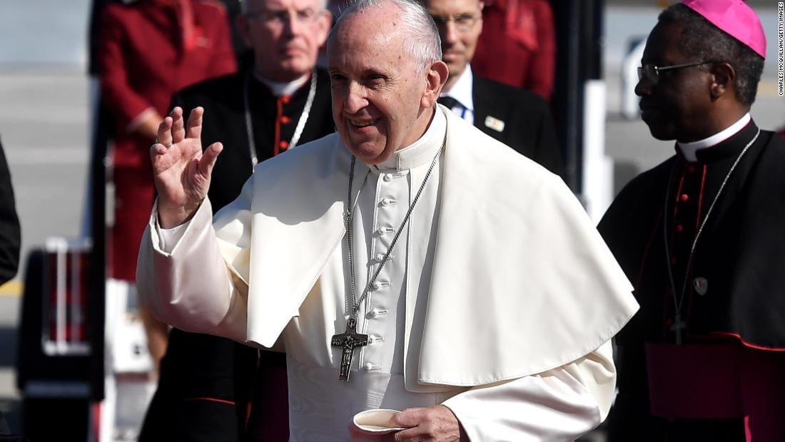 Pope Francis waves to the crowd at Dublin Airport on Saturday.