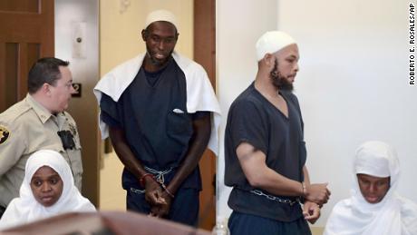 From left, suspects Jany Leveille, Lucas Morton, Siraj Wahhaj and Subbannah Wahhaj at a hearing in Taos, New Mexico, on August 13. 