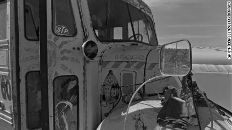 A broken bus on the property of the Hog Farm Collective commune in Llano, New Mexico, in 1969.