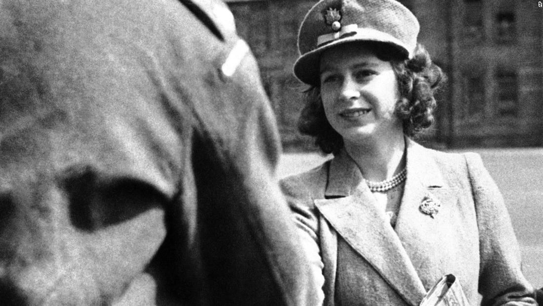 Princess Elizabeth shakes hands with an officer of the Grenadier Guards on May 29, 1942. King George VI made Elizabeth an honorary colonel in the Royal Army regiment.