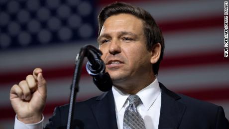 US Representative Ron DeSantis, Republican of Florida, and candidate for Florida Governor, speaks during a rally with US President Donald Trump at Florida State Fairgrounds Expo Hall in Tampa, Florida, on July 31, 2018. (Photo by SAUL LOEB / AFP)        (Photo credit should read SAUL LOEB/AFP/Getty Images)