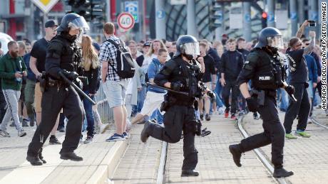 Riot police in Chemnitz on Sunday as far-right protesters marched in the streets.