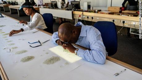 Employees grade and store rough diamonds at the Namibian Diamonds Trading Company in Windhoek, Namibia. 