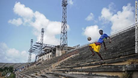 A Somali boy handles a ball at the Mogadishu stadium after African Union forces left the stadium on August 28.