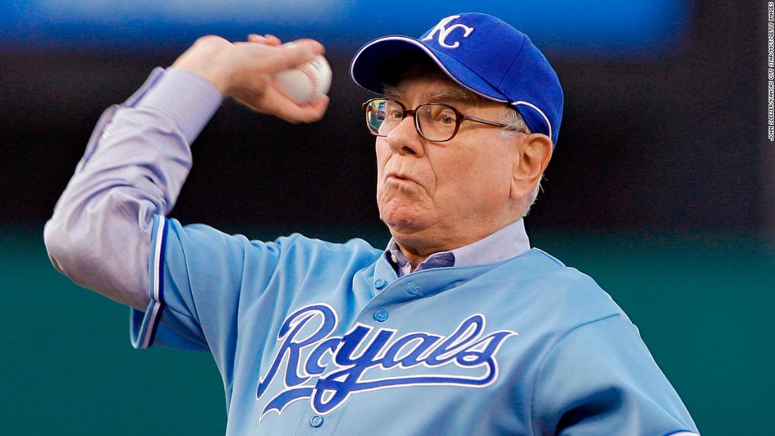 Buffett throws out the first pitch before a Kansas City Royals baseball game in 2008.