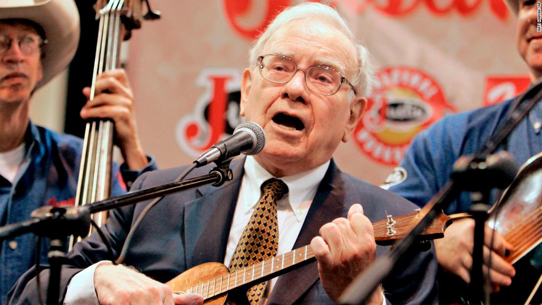 Buffett plays the ukulele with a band during the Berkshire Hathaway meeting in 2007. He learned the instrument decades ago.