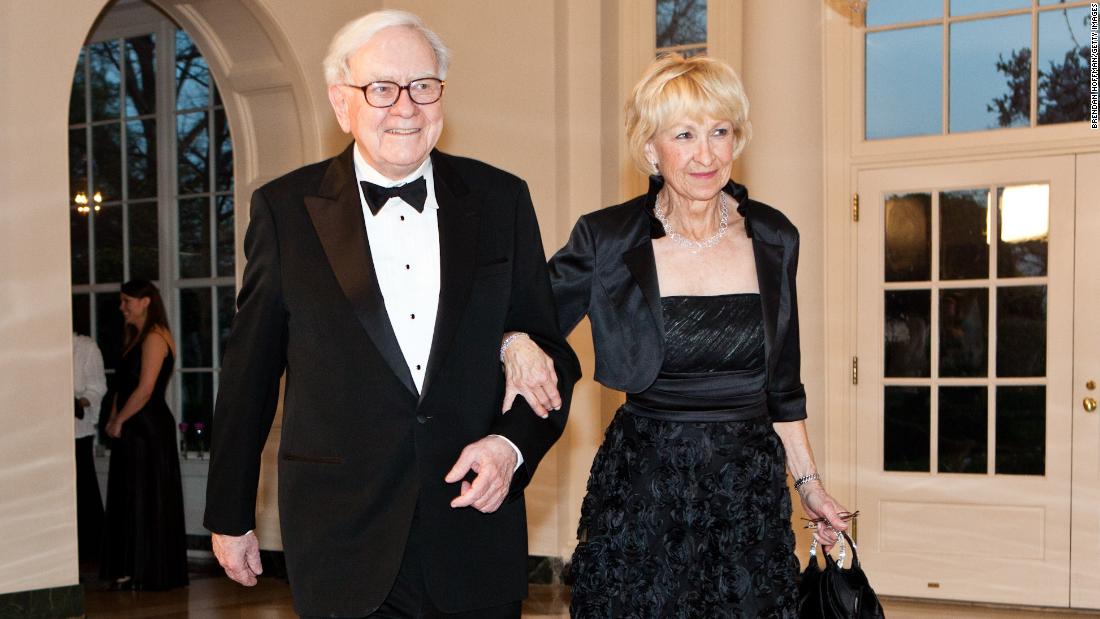 Buffett and his second wife, Astrid, arrive at the White House for a state dinner honoring British Prime Minister David Cameron in 2012. The next month, Buffett confirmed that he had been diagnosed with Stage 1 prostate cancer. He underwent radiation treatments and told Berkshire Hathaway shareholders that the cancer was &quot;not remotely life-threatening.&quot;