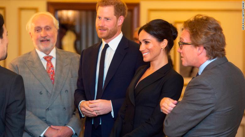 Prince Harry, Duke of Sussex and Meghan, Duchess of Sussex speak with writer Lin Manuel Miranda and others from Sentebale.