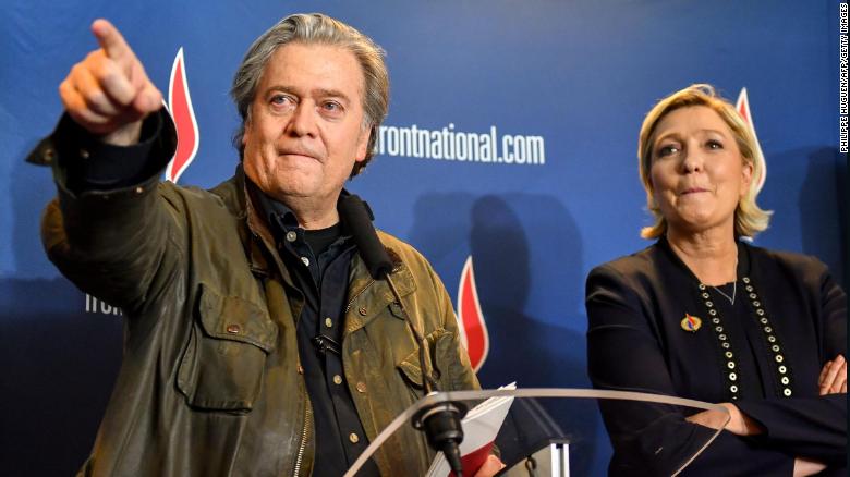 Steve Bannon, left, with France&#39;s far-right leader Marine Le Pen after giving a speech at her party&#39;s annual congress on March 10, 2018 in Lille, France.