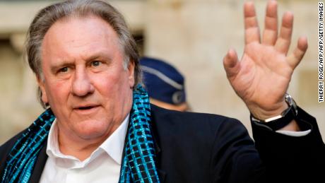 French actor Gerard Depardieu waves as he arrives at the Town Hall  in Brussels for a ceremony as part of the &#39;Brussels International Film Festival&#39; (Briff) on June 25, 2018. (Photo by THIERRY ROGE / BELGA / AFP) / Belgium OUT