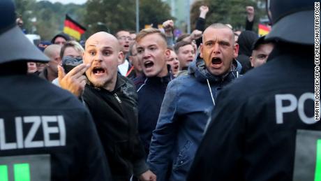 Right-wing protesters confront policemen during a demonstration in Chemnitz Saturday. 