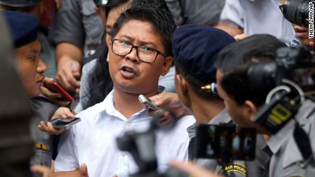 Wa Lone is escorted out of court by police on Monday. 