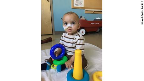 Guillermo Timoteo sitting up after treatment.