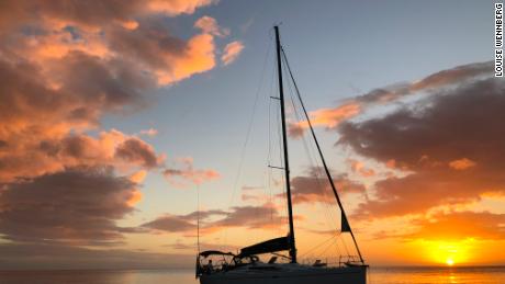 Take Off, the Wennberg&#39;s 41-foot Elan 410 yacht, at sunset in Dominica, in the West Indies.