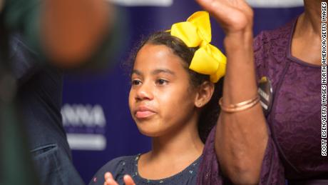 Ayanna Pressley's stepdaughter, Cora Harris, cries during her victory speech onTuesday night.