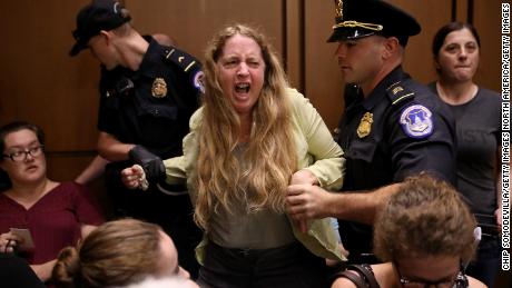 Protesters disrupt the confirmation hearing for Supreme Court nominee Judge Brett Kavanaugh before the Senate Judiciary Committee in the Hart Senate Office Building on Capitol Hill September 4, 2018.