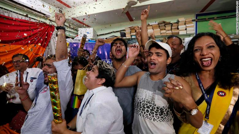 Crowds in Mumbai cheer the Supreme Court announcement.  
